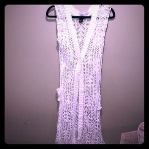 Long crocheted sleeveless sweater